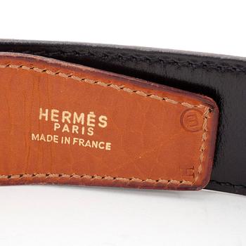 HERMÈS, a brown leather belt from the 1970s.