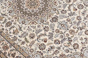 A carpet, Nain part silk so called 6 LAA, signed, ca 240 x 137 cm.