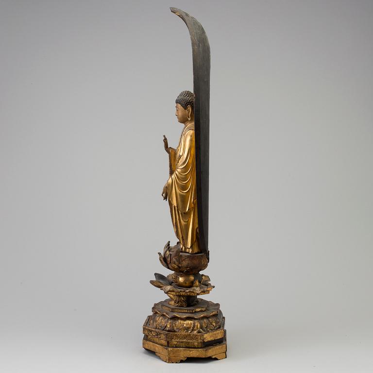 A large wooden lacquered figure of buddha, Japan, 19th Century.