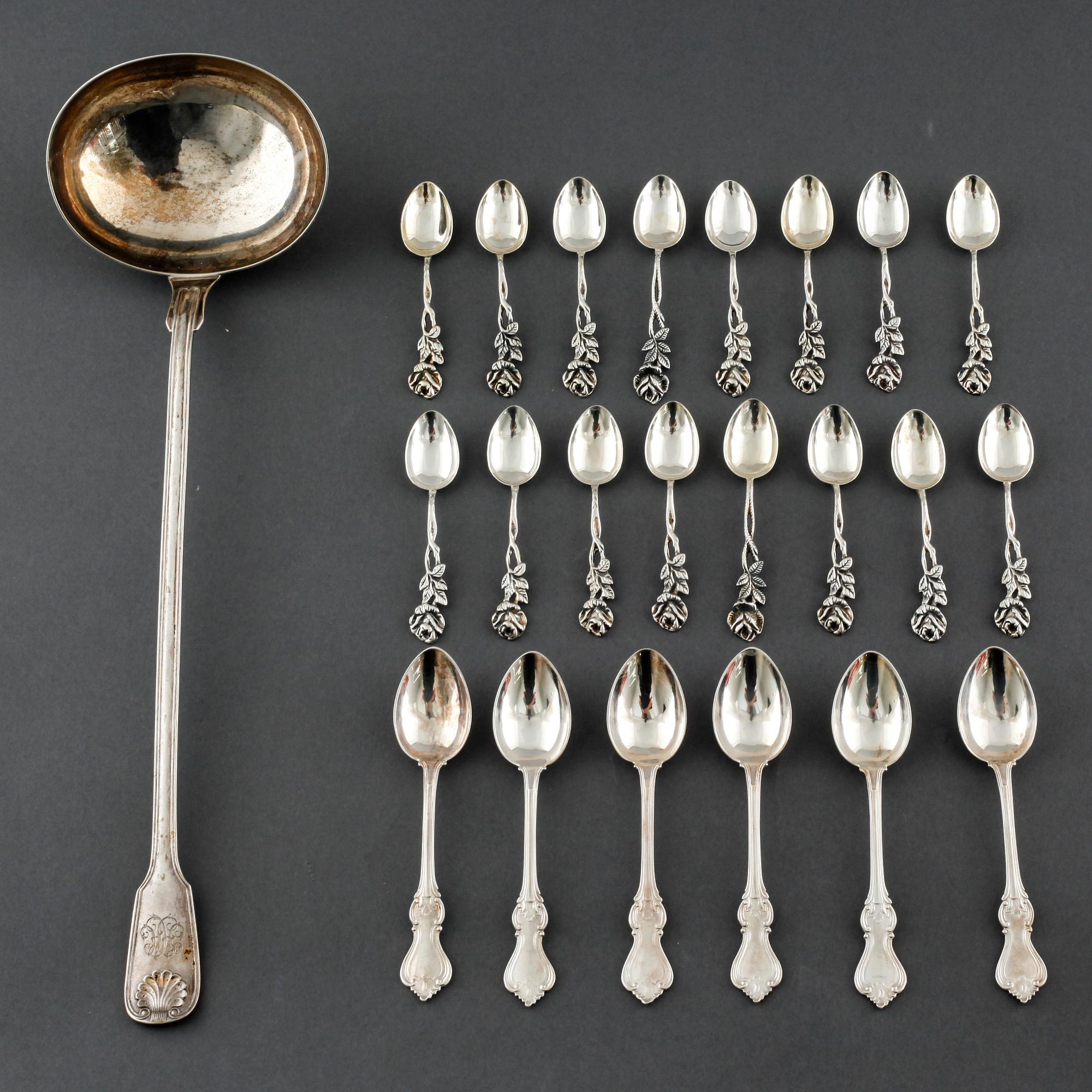 22 swedish silver spoons and one ladle, from the 19th and 20th century.
