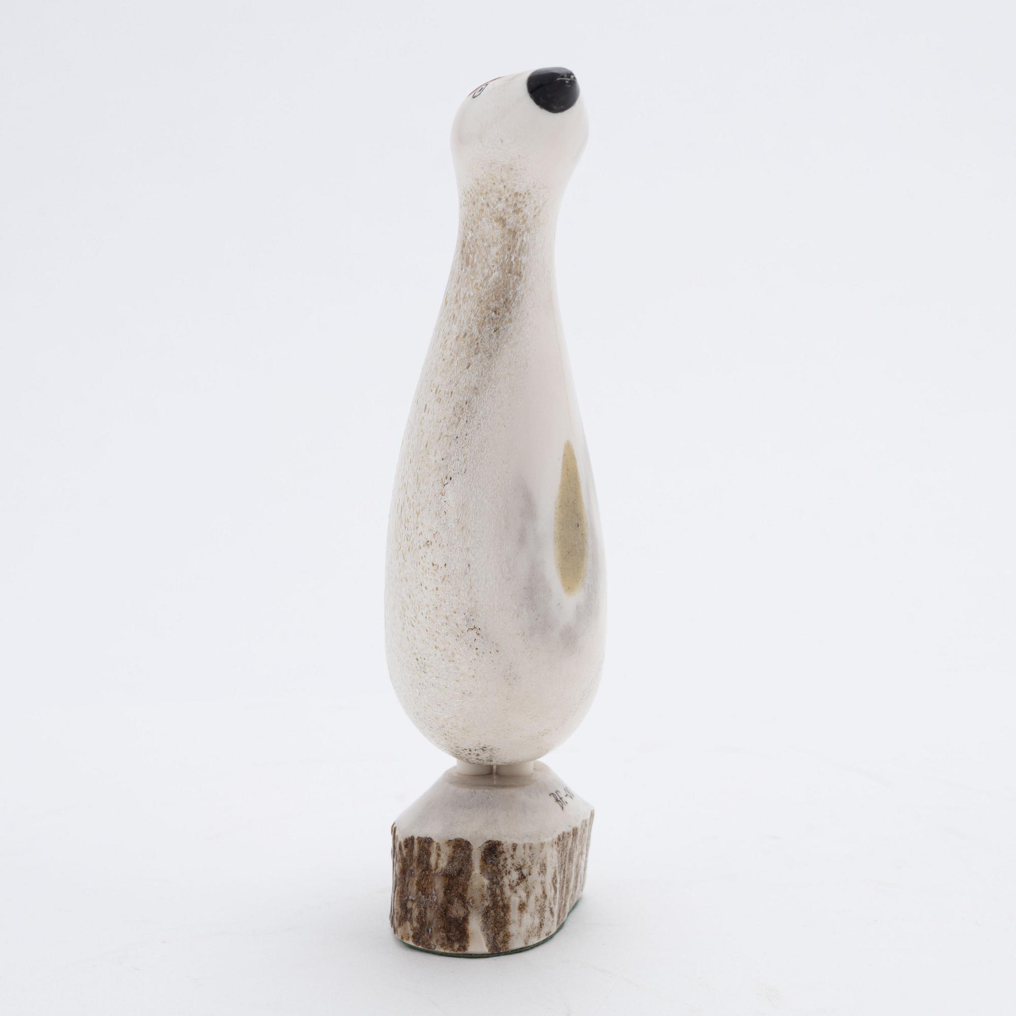 A reindeer horn figurine by Bertil Fällman, signed and dated -00.