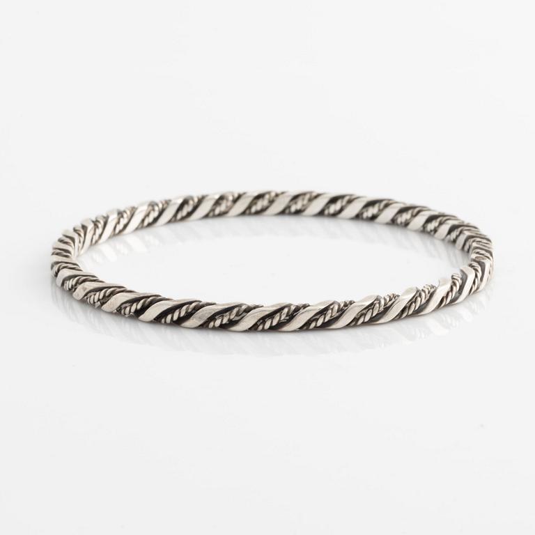 A Georg Jensen bangle in sterling silver.