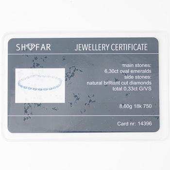 Bracelet 18K white gold with emeralds and brilliant-cut diamonds.