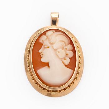 A 14K gold and shell cameo jewelry set, bracelet, pendant/brooch and ring.