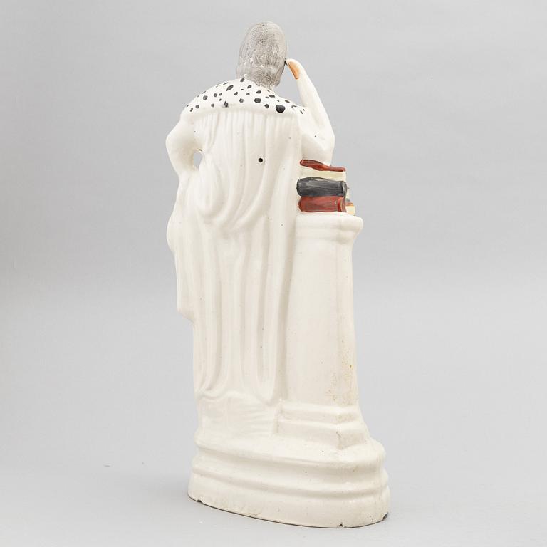 A set of eight English flintware figurines, 20th Century.