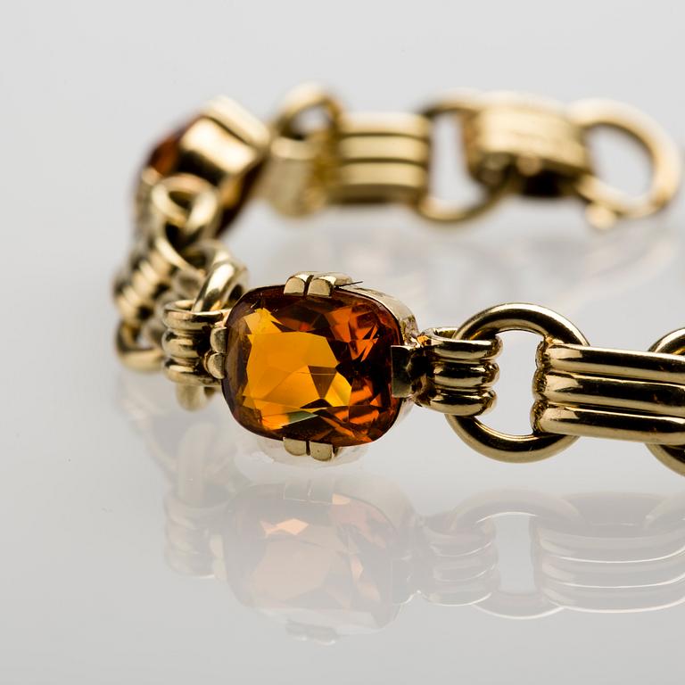 ARMBAND, 14 K guld med citriner, ca 9.00 ct. Vikt ca 16 g.