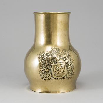 A 19th century brass champagne cooler.