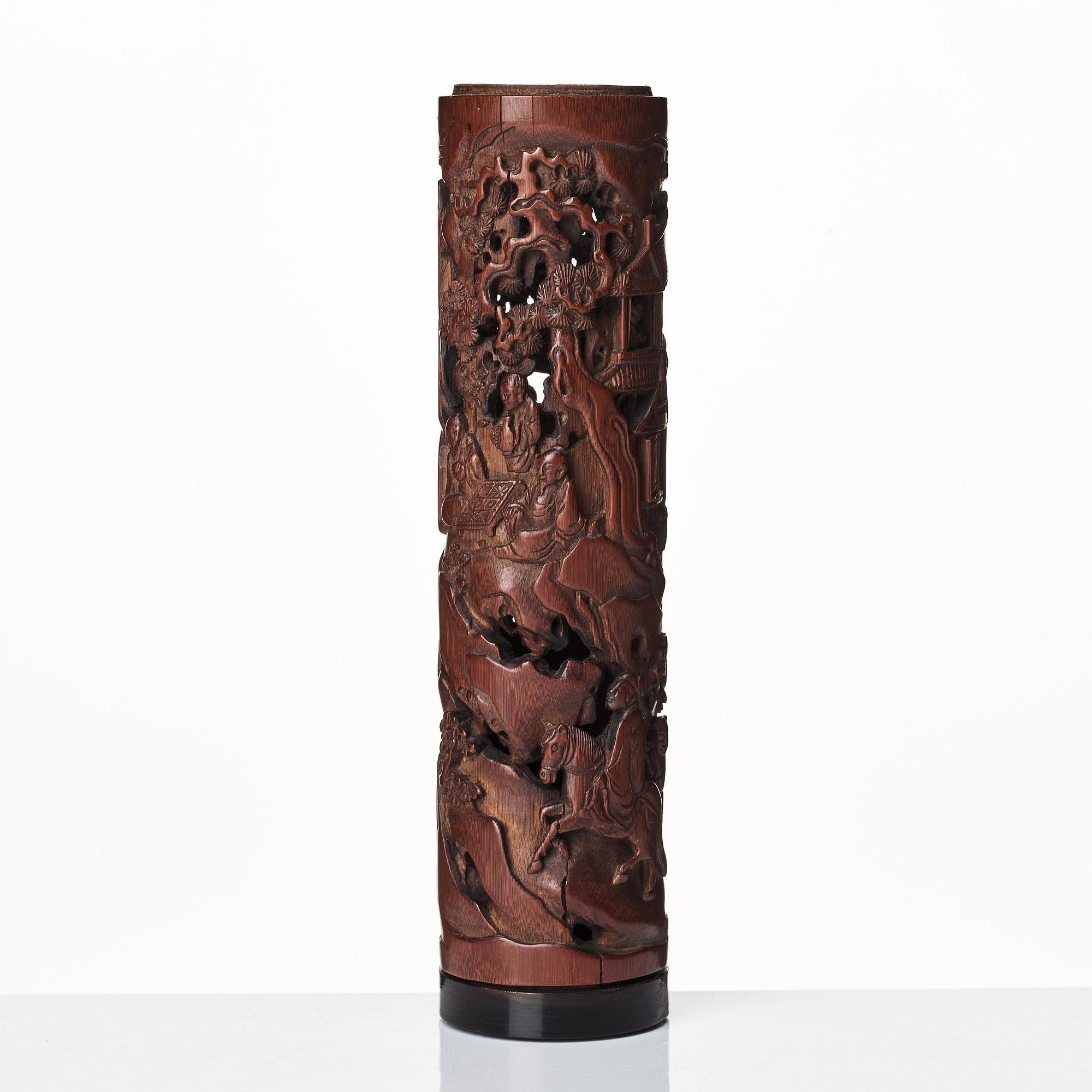 A carved cylindrical bambo parfumier, Qing dynasty, 19th Century.