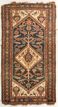 A probably later part of the 19th century Kurd carpet ca 190 x 116 cm.