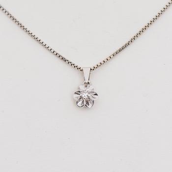 HÄNGE, 14K vitguld, briljantslipad diamant 0,10 ct. Vikt 3,8 g.