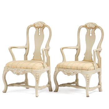 69. A pair of Swedish rococo open armchairs, Stockholm, later part 18th century.
