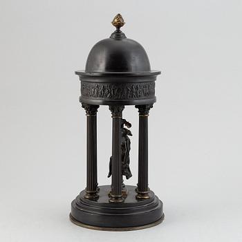 A stone and brass table decoration, late 19th century.