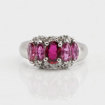 Ring in 850 platinum with navette-cut pink sapphires and round brilliant-cut diamonds.