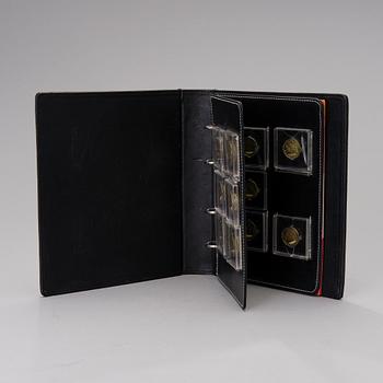 A set of eleven collector's coins from the Olympic Games, China 2008.