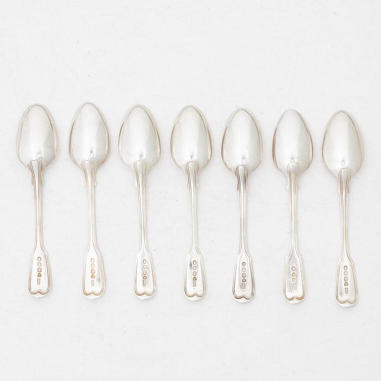 Seven silver spoons, French model, mostly William Comyns, London 1916.