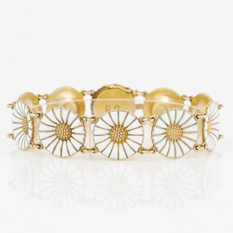 Georg Jensen and A Michelsen "Daisy" a bracelet, a pendant, and a brooch silver gilt and enamel.