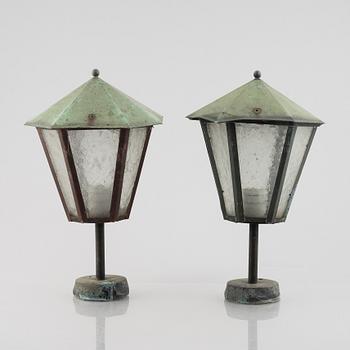 Outdoor lighting for gate posts, a pair, early 20th century.