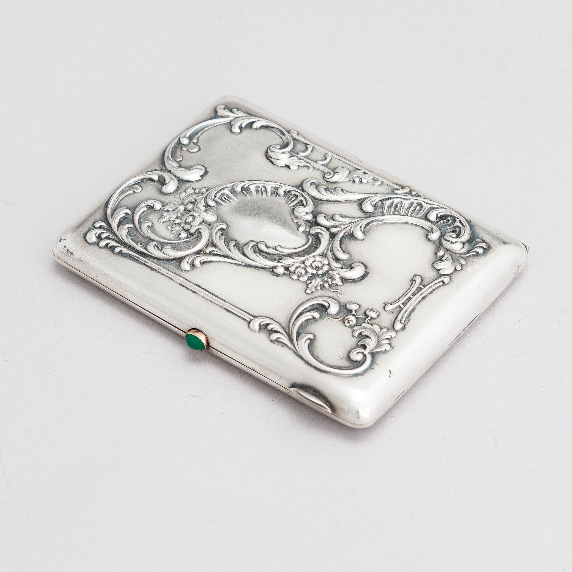 A Russian silver cigarette case, maker's mark of Mikhail Tarasov, Moscow 1908-14.