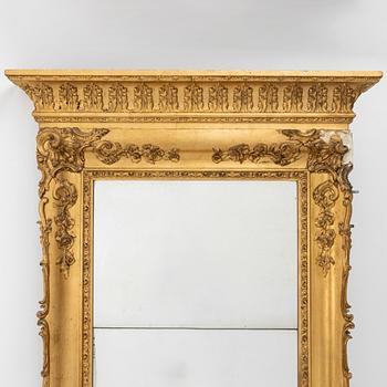 A Rococo style mirror, late 19th Century.