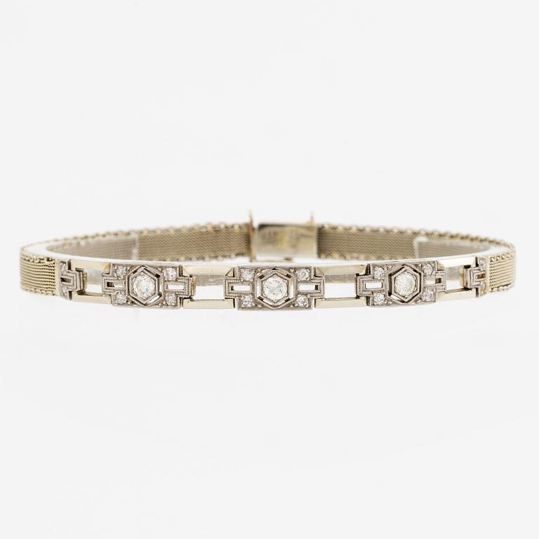 Arm bracelet, 18K white gold with brilliant-cut diamonds, old cut and octagonal-cut diamonds.