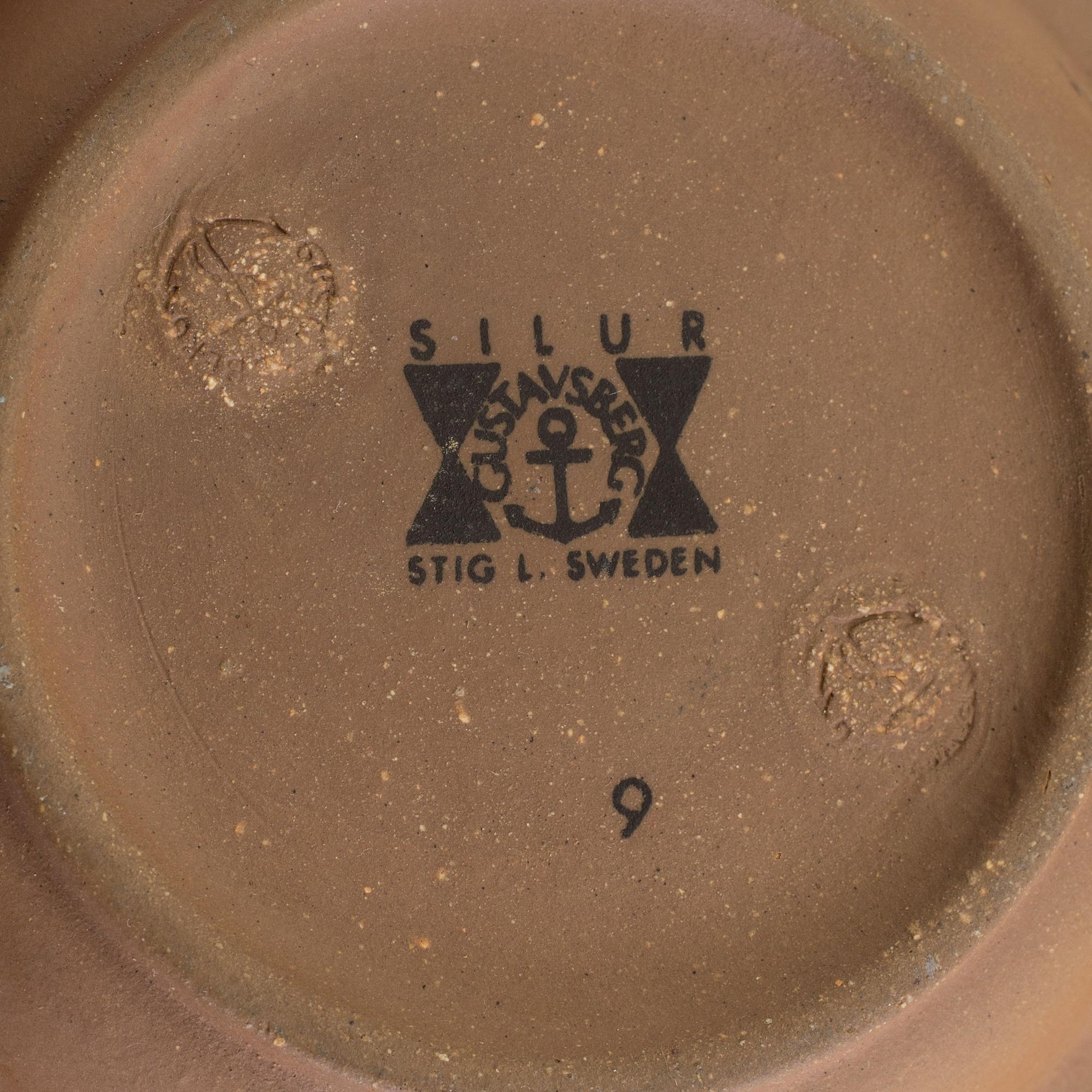 Four mid 20th century dishes by Stig Lindberg for Gustavsberg, two 'Domino', one 'Silur' and one signed.
