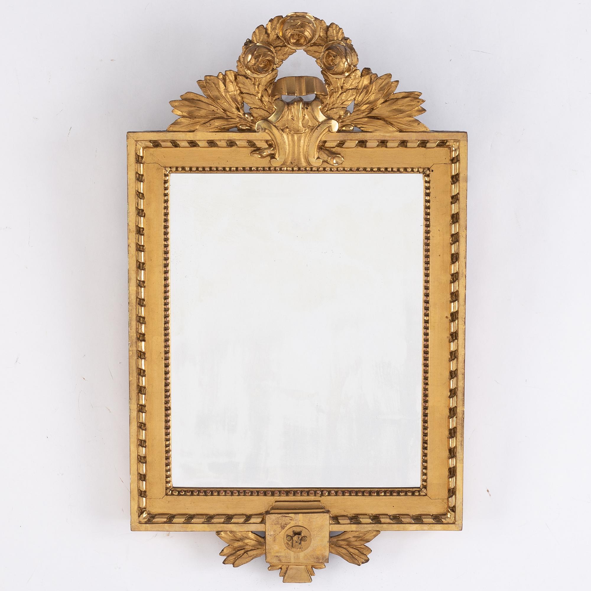 A Gustavian style gilded and bronzed scone, first half of 20th century.