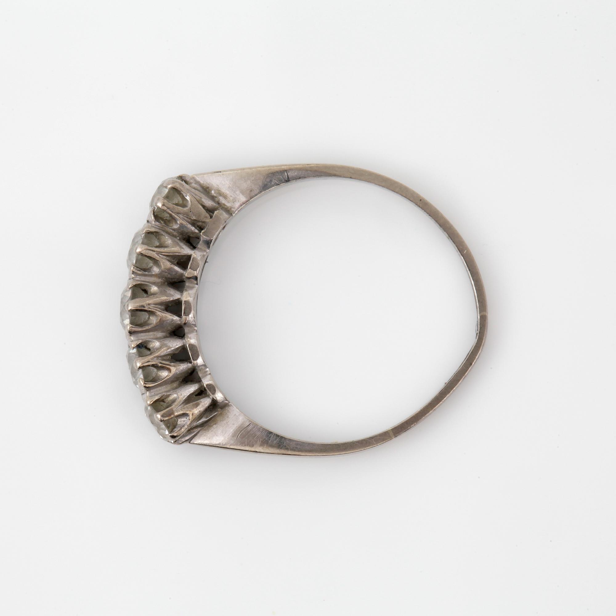 RING, vitguld 18K, briljantslipade diamanter, otydliga svenska stämplar, 1900-tal. Tot ca 2 gram.