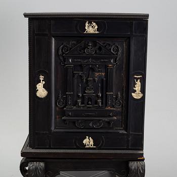 A baroque style cabinett, 19th century.