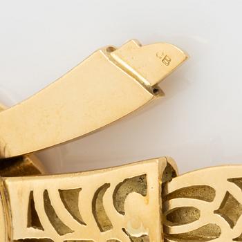 A Bucherer 18K gold pendant.