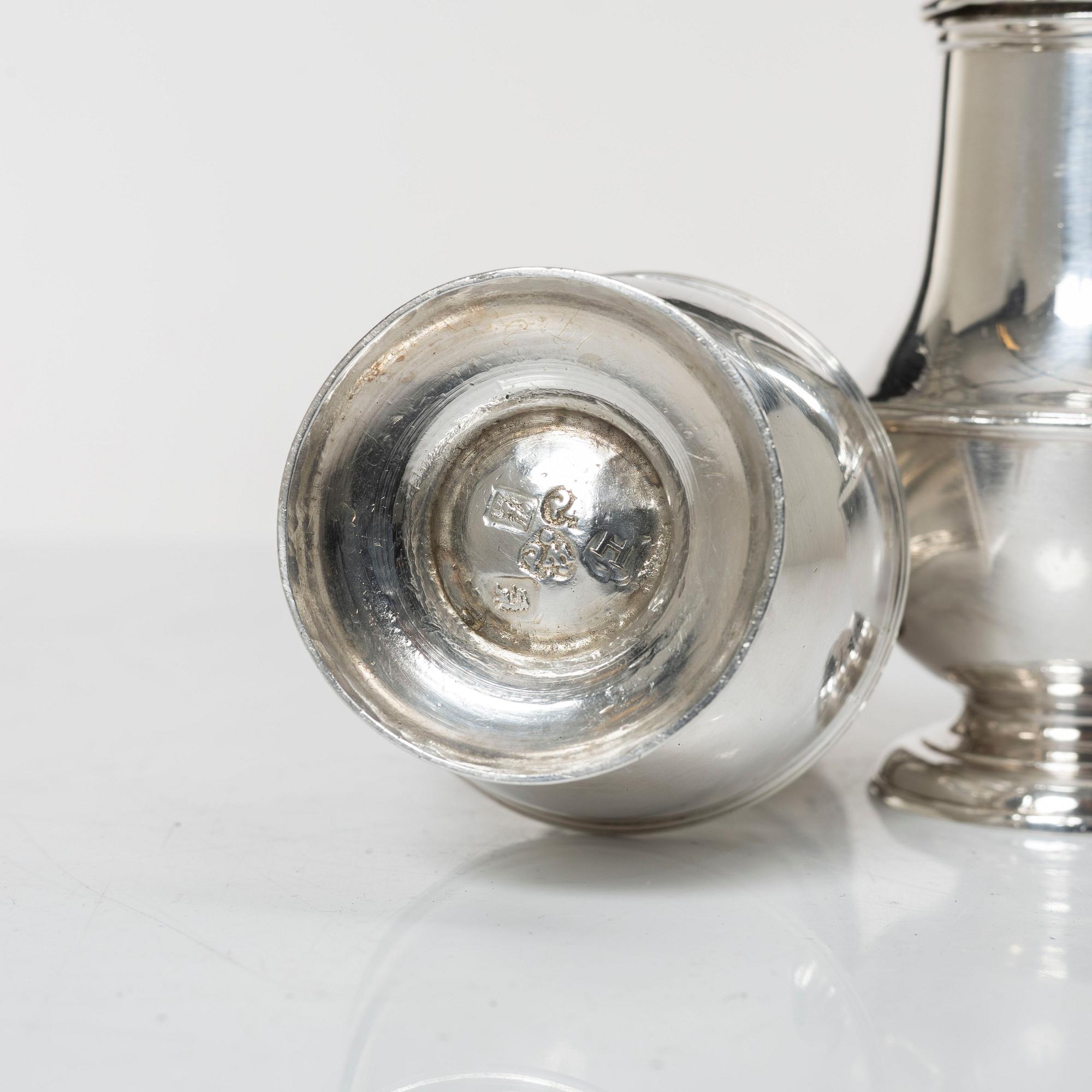 A pair of Britannia standard silver sugar-casters, marks of Samuel Welder, London, 1723.