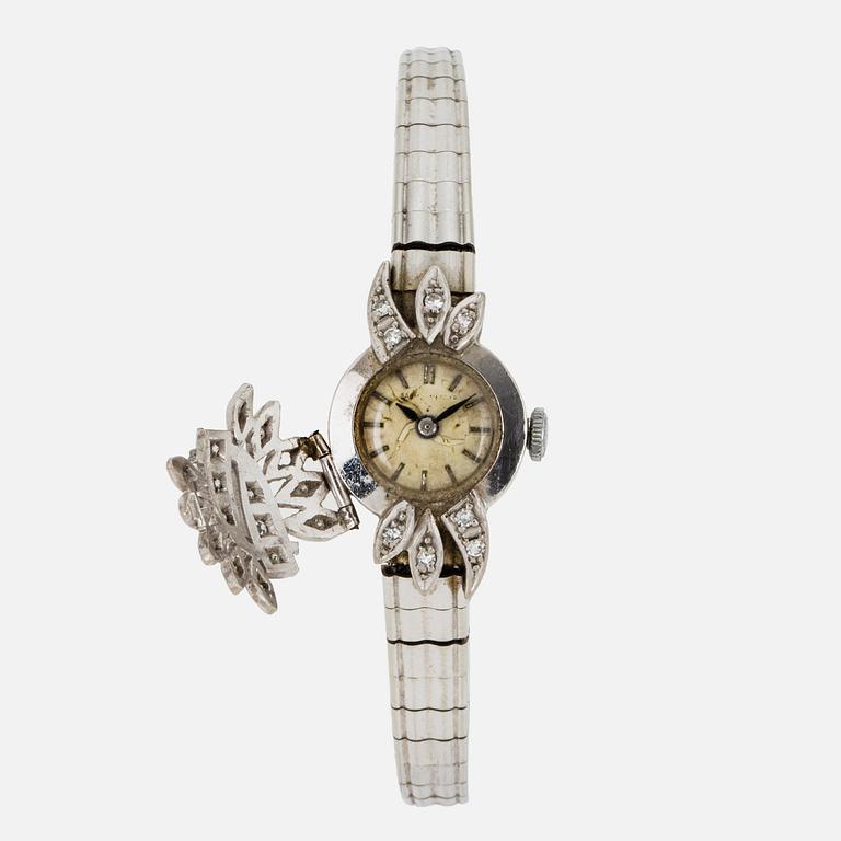 A ladies diamond watch.