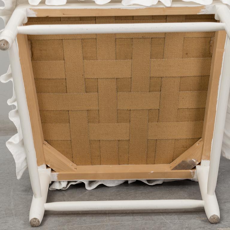 A Gustavian-style late 20th century armchair.