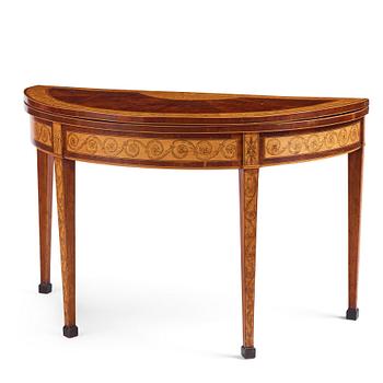44. A Russian Louis XVI mahogany and birch parquetry demi-lune games table, late 18th century.