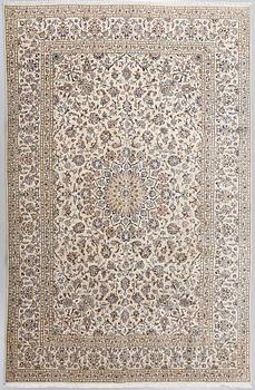 A Keshan rug, 340 x 236 cm.
