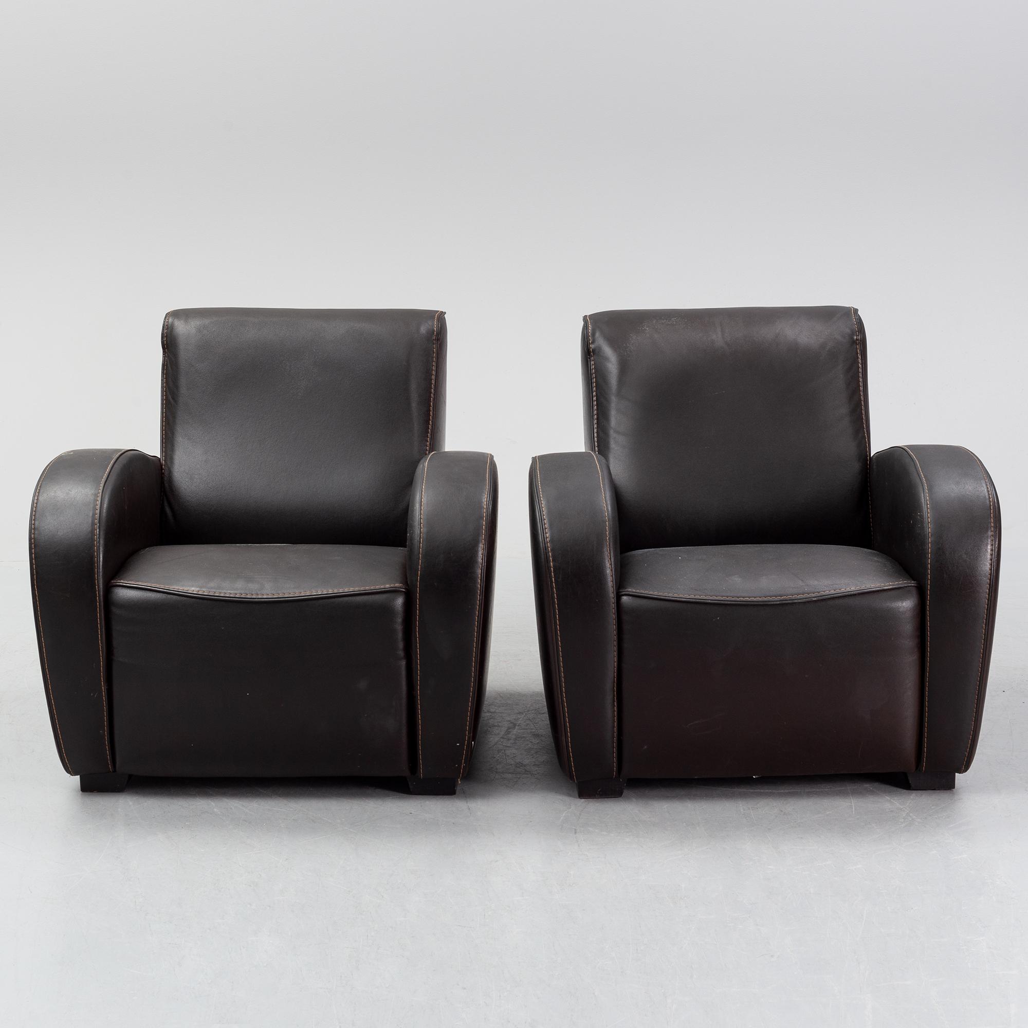A pair of Italian leather armchairs from  Industria Divani e Poltrone, 21st-century.
