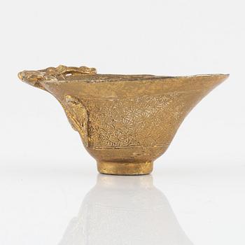 A gilt bronze libation cup, China, presumably 20th Century.