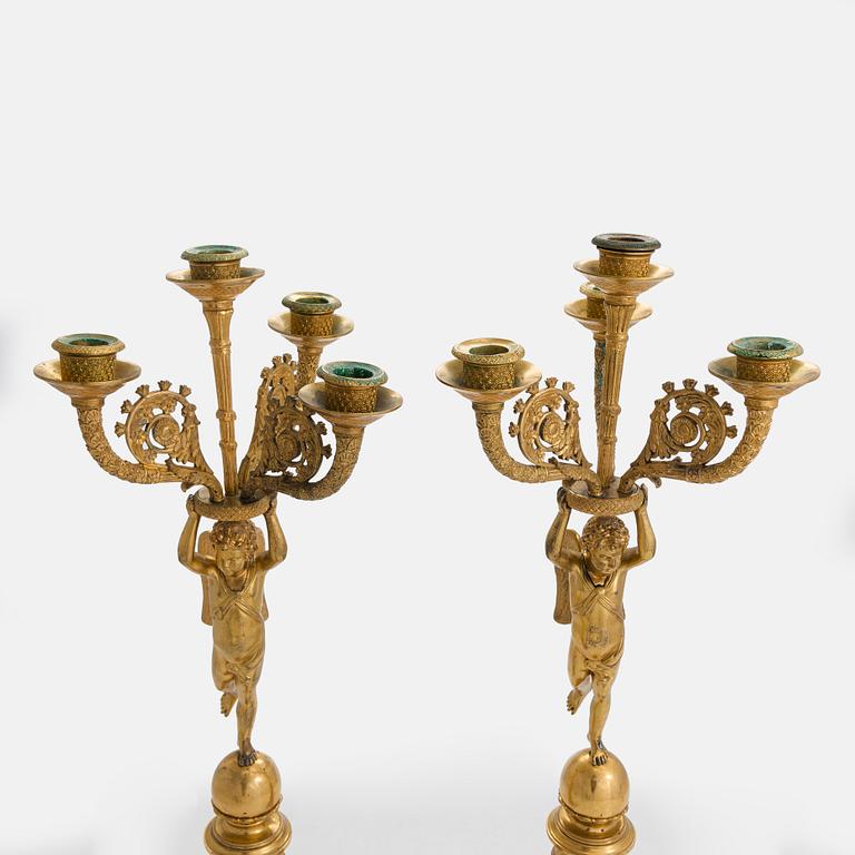 A pair of Charles X four-light candelabra, France, around 1820.