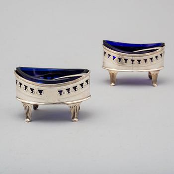 A pair of English 18th century silver and blue glass salts, mark of John Robert probably, London.