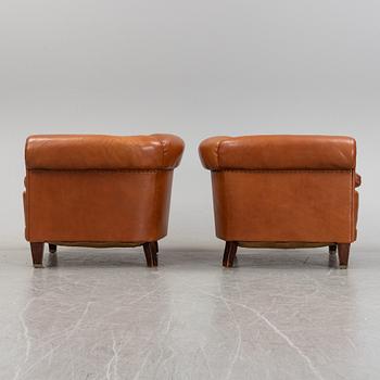 A pair of leather upholstered club chairs, 1930/40's.