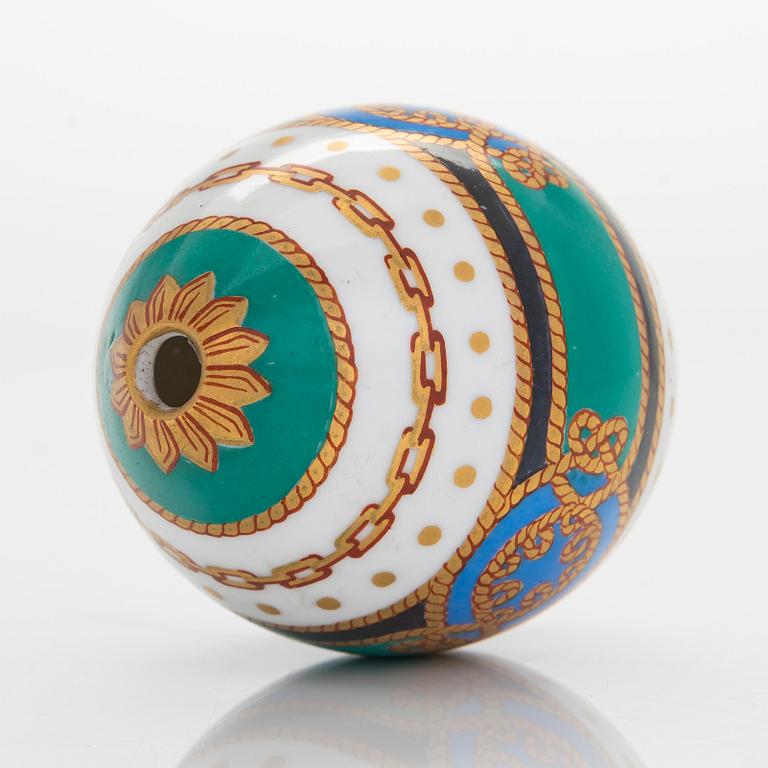 A Russian porcelain egg, part of the Derzhava service,Imperial Porcelain Factory, Saint Petersburg late 19th century.