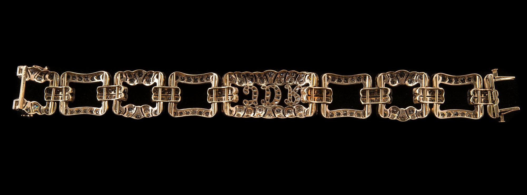 ARMBAND, 259 antik- och rosenslipade diamanter ca 7 ct. 18K guld, silver. Längd 18,5 cm, vikt 38,8 g.