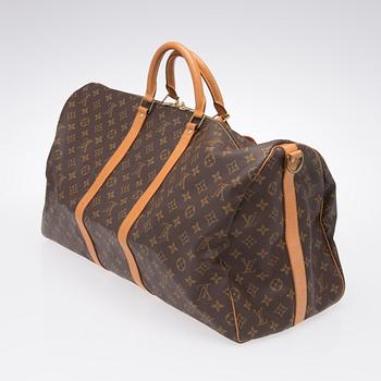 A Keepall Bandouliere 55 WEEKEND BAG by Louis Vuitton.