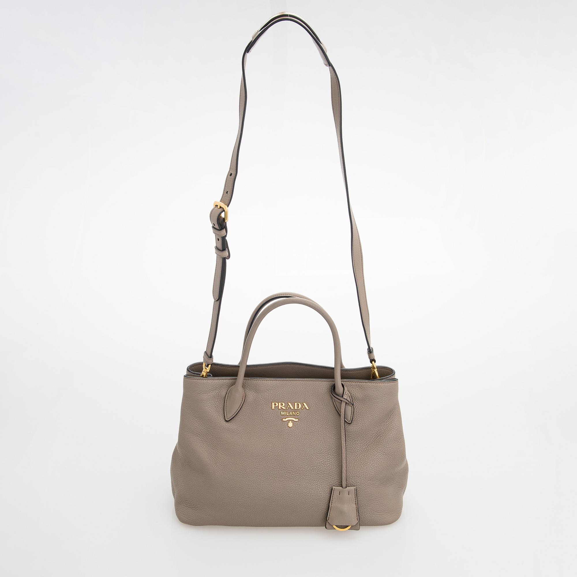 Prada, a clay gray leather handbag, 2020.