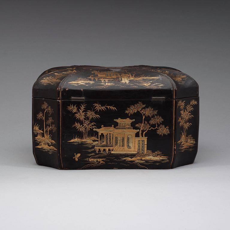 A black and gold laquer tea box, Qing dynasty 19th century.