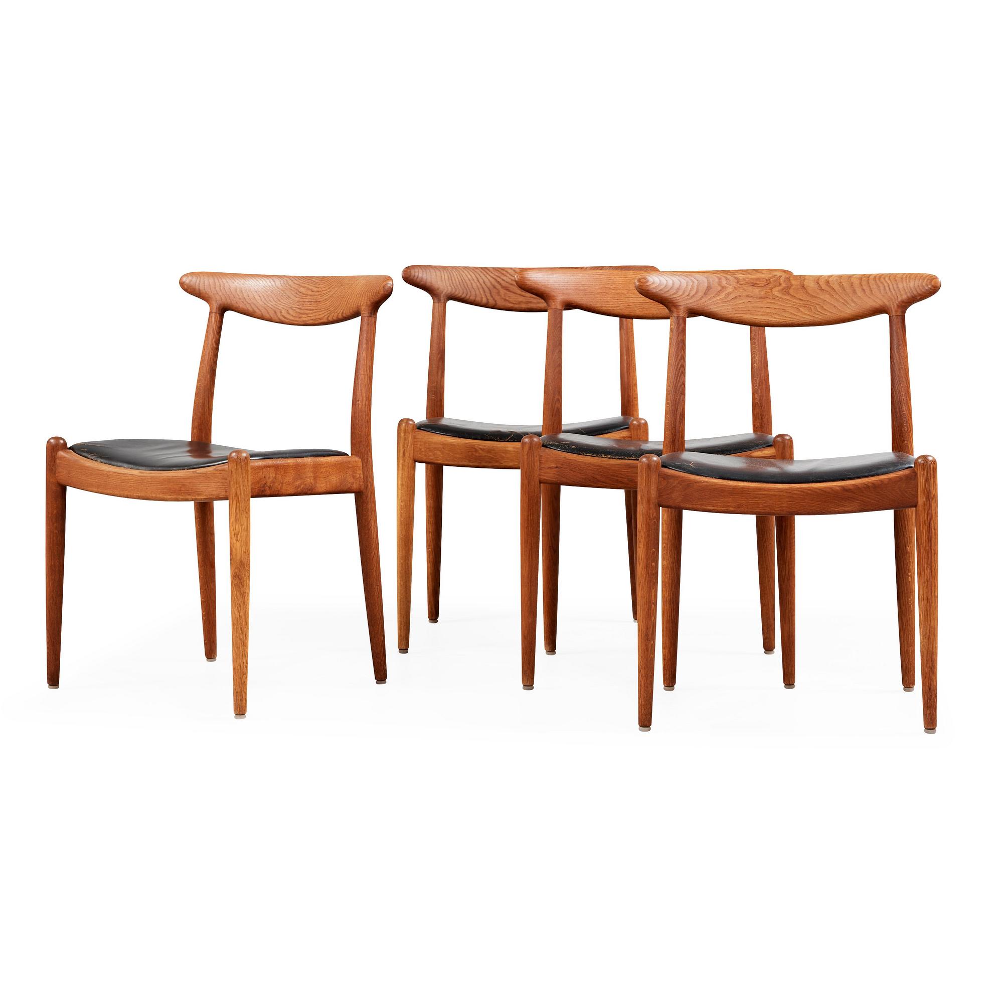 A Hans J Wegner oak dinner table 'AT 312' and four oak and