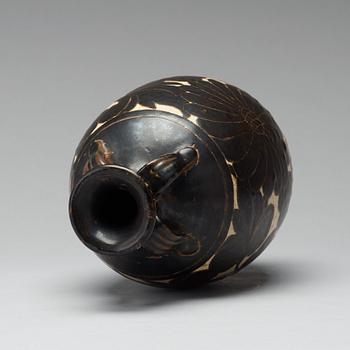 A black-glazed sgraffito vase, presumably Yuan Dynasty.