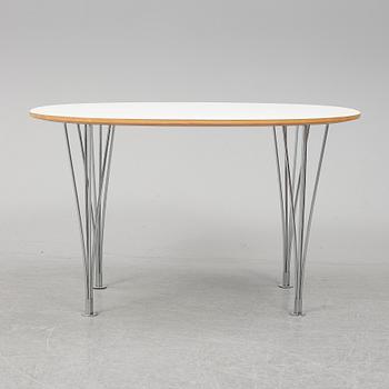 A 'Superellips" table by Bruno Mathsson & Piet Hein for Mathsson International darted 2011.