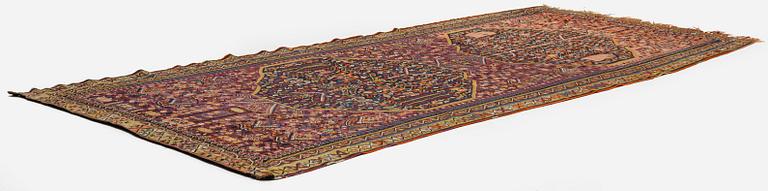 An antique kilim, southeastern Anatolia/Caucasus, c. 398 x 176 cm.