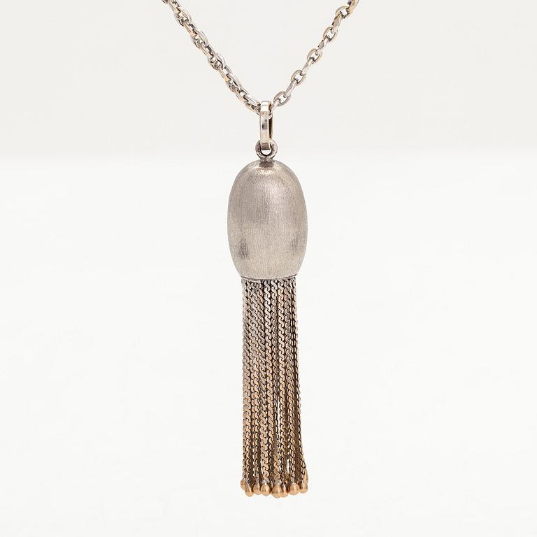 An 18K white gold necklace, with a tassel pendant. Switzerland.