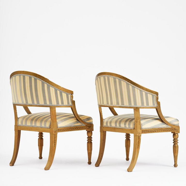 A pair of late Gustavian open armchairs attributed to E. Ståhl (master in Stockholm 1794-1820).